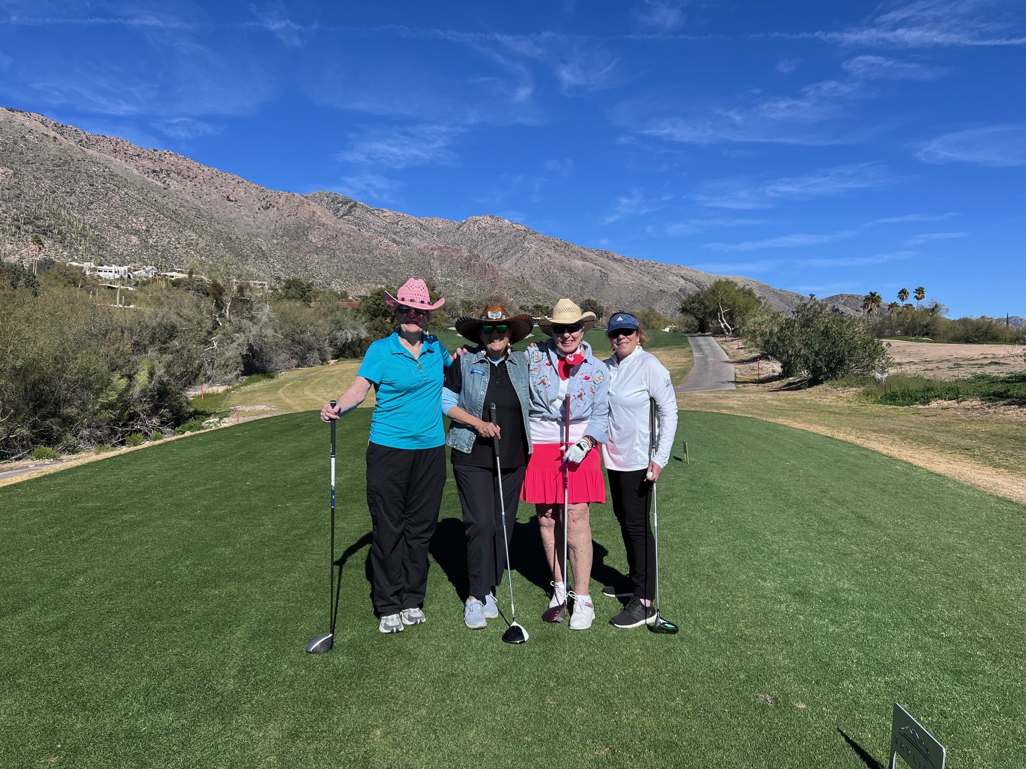 group of golfers on the course