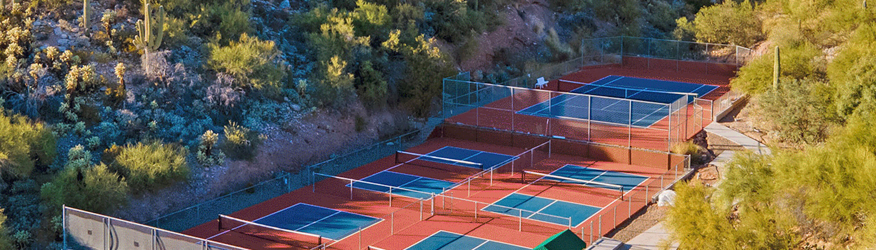 tennis courts and surrounding landscape